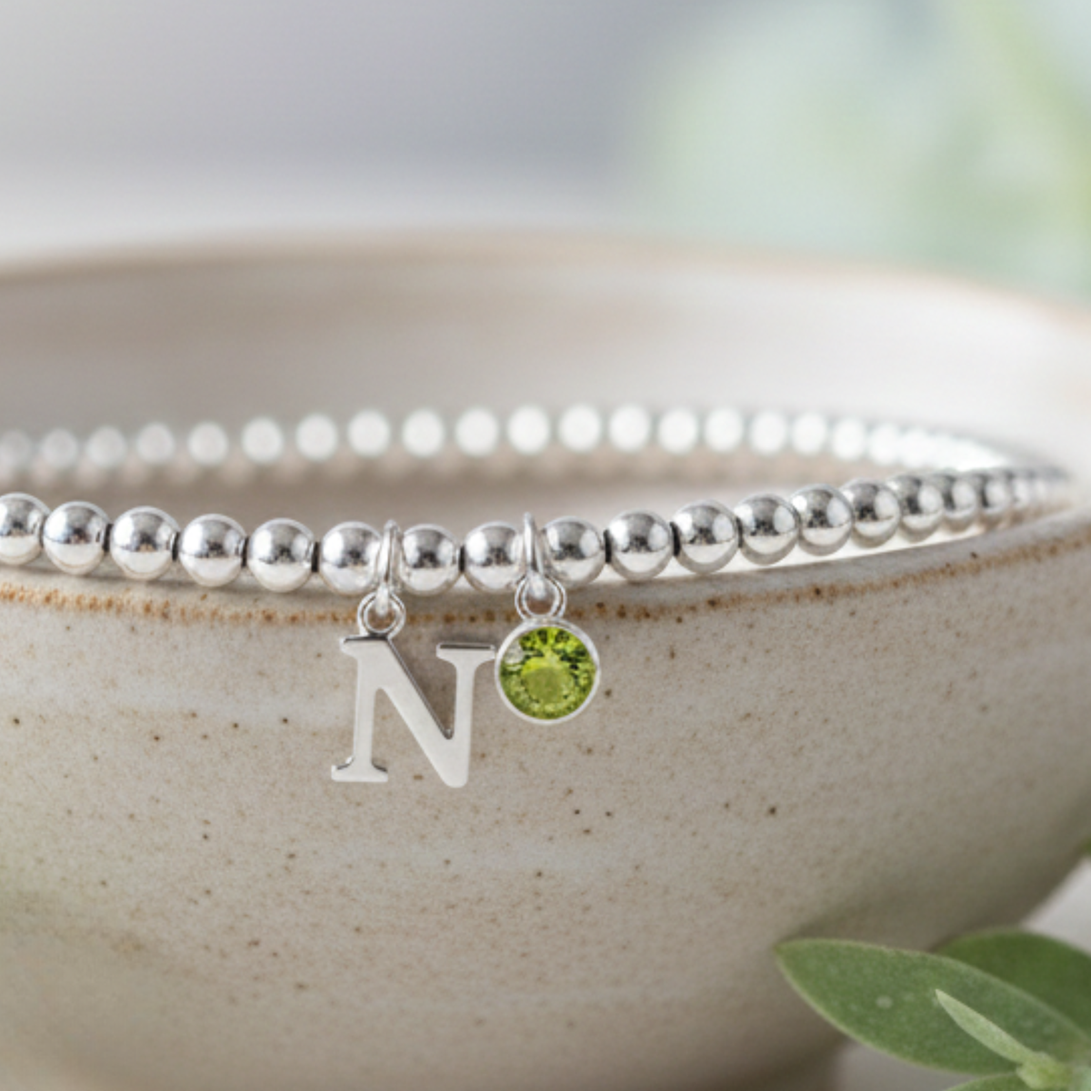 Initial & August Birthstone Bracelet | Personalised Stretch Bead Bracelet